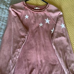 Seeing stars in this cute Easel sweatshirt size small. Faded red with stars.